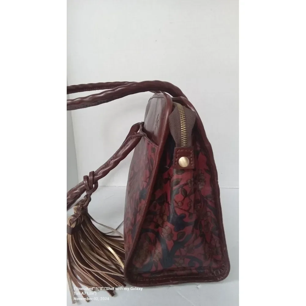 Vintage Tooled Leather Handbag with Tassel‎ Detail Brown Burgundy Floral Pattern